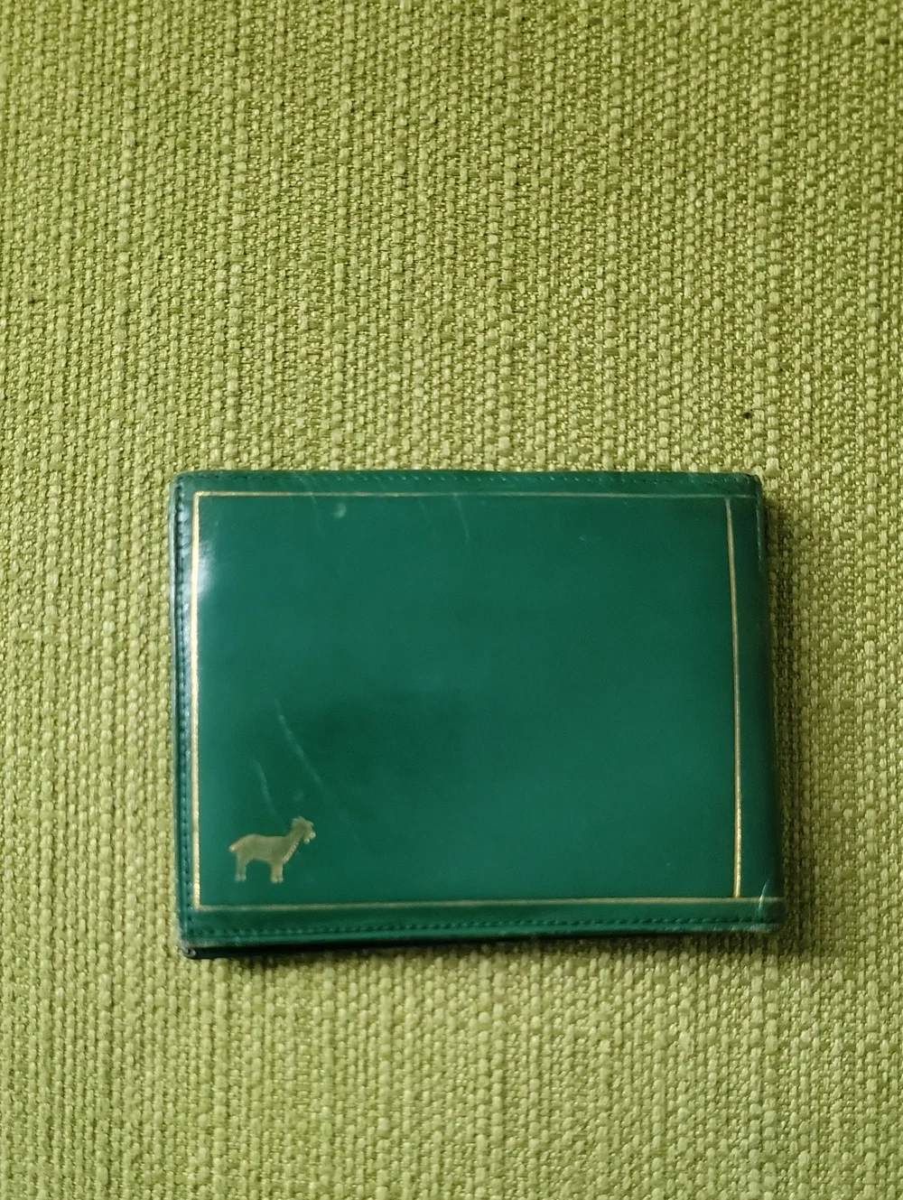 Green Leather Bifold Wallet with Gold Goat Accent